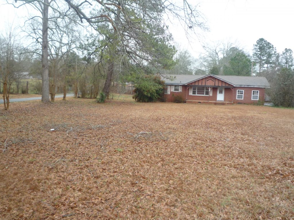 Brick home with pool ready to finish rehab